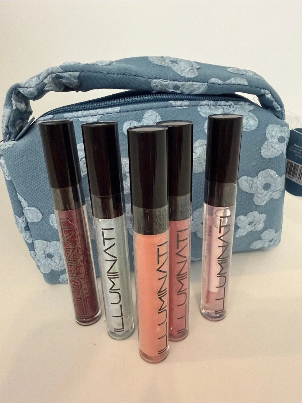 Blue Floral Cosmetic Pouch and FIVE Illuminati Lip Color